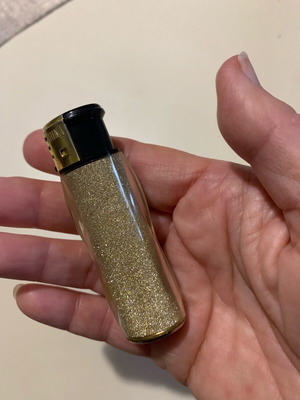 Lighter for women's bags like new with gold glitter cover