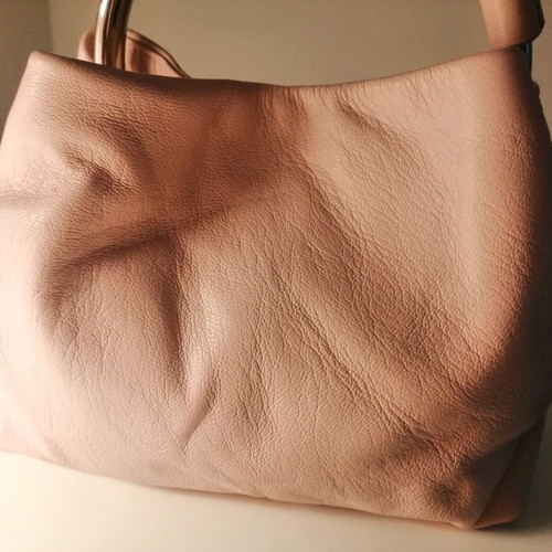 Rollini leather wrist bag new, pink color