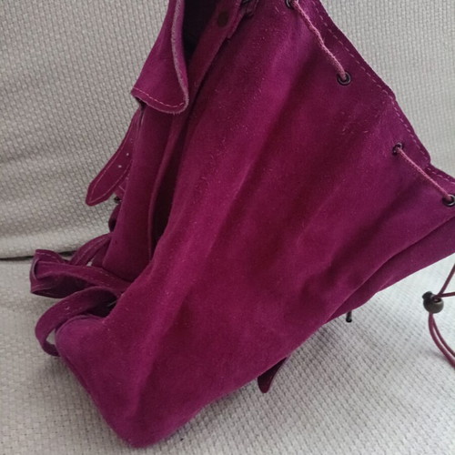 Leather backpack fuchsia used with some wear