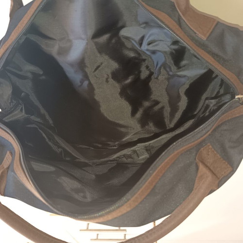 Laptop bag new, black with brown handles and zipper compartments