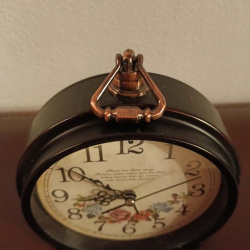 Vintage clock used, old style, battery operated