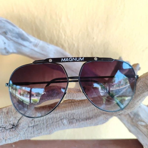 Vintage 90s Magnum sunglasses, one broken lens