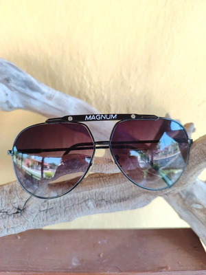 Vintage 90s Magnum sunglasses, one broken lens