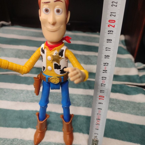 Woody action figure from Toy Story 23cm used, missing hat and nose damage