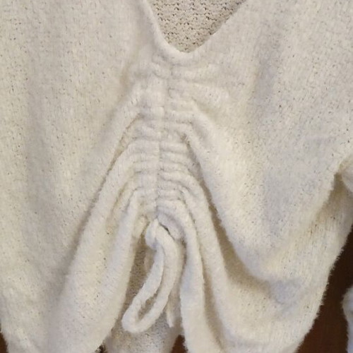 Beige blouse like new, slightly worn with unique design