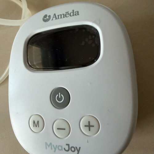 Ameda Mya Joy single breast pump like new with extra bottles