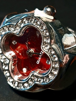 Four-Leaf Clover Ring like new with crystals, quartz watch and red dial