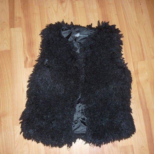 Women's sleeveless black polyester medium vest used