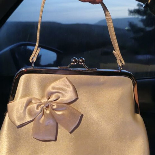 Avon vintage satin evening bag new, ecru with bow