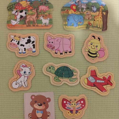 Wooden and paper puzzles used for children