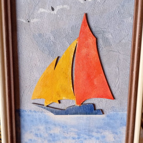 Handmade embossed wooden frame with sailboat