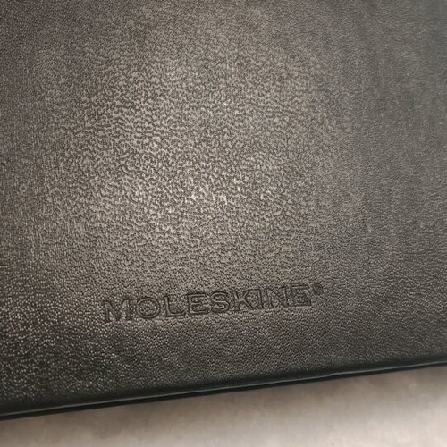 Moleskine travel journal like new with black hard cover