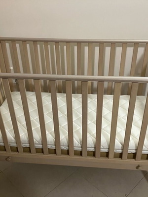 Baby crib used with mattress and wooden changing table