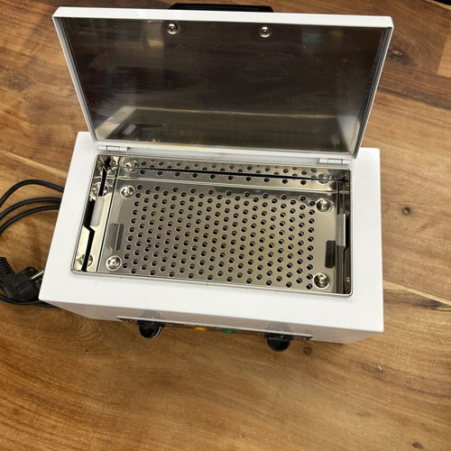 Tau Steril Mini Automatic dry heat sterilizer used