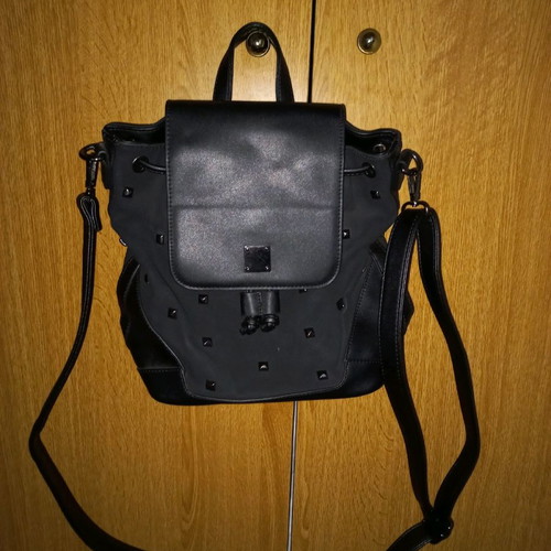 Crossbody bag new, black color, convertible to backpack