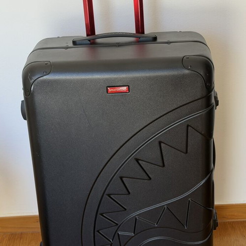 Sprayground limited edition full-size luggage used, black