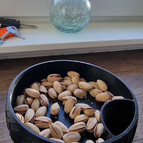 Bowl for peanuts and nuts new with integrated shell container