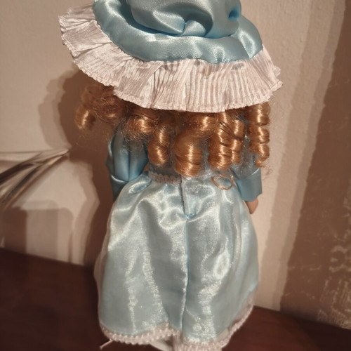 Porcelain doll, decorative, blue or burgundy