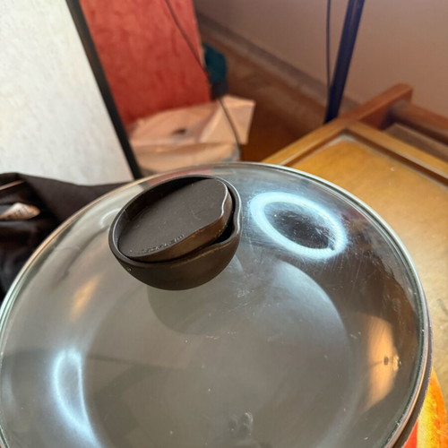 Frying pan with lid used, black