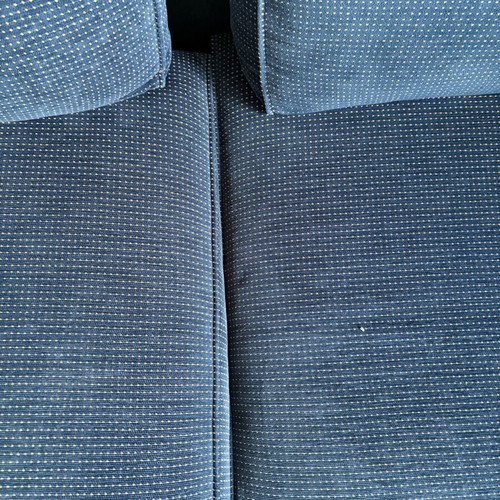 Two dark blue used two-seater sofas set