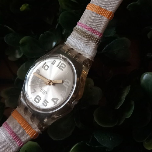 Swatch Vintage Women's Watch like new, silver dial, rainbow cloth band
