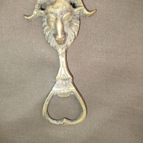 Bronze bottle opener used
