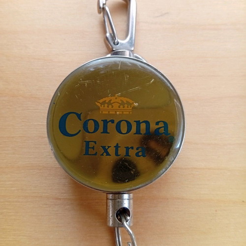 Corona Extra keychain bottle opener used with retractable strap