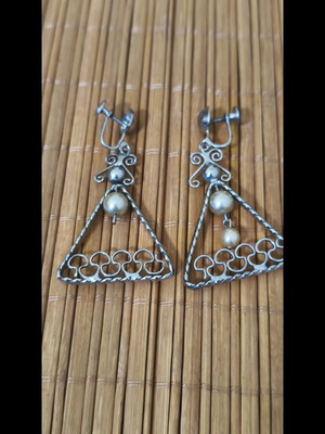 Clip-on dangle earrings used