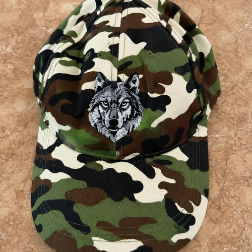 Camouflage baseball cap with embroidered wolf