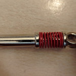 Shock absorber keychain, red