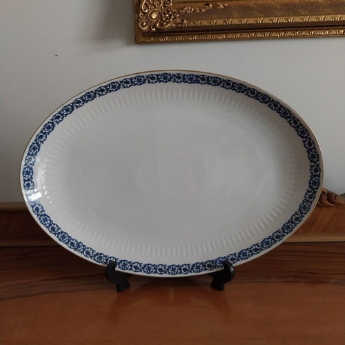 Porcelain like new, 2 Limoges salad bowls and 2 Sherzer platters