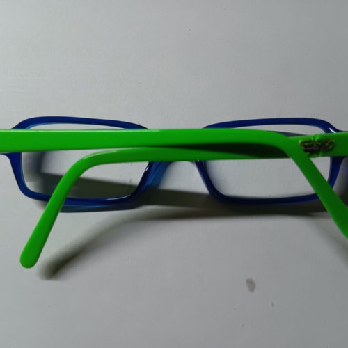 Children's glasses used, green and blue with repaired right arm