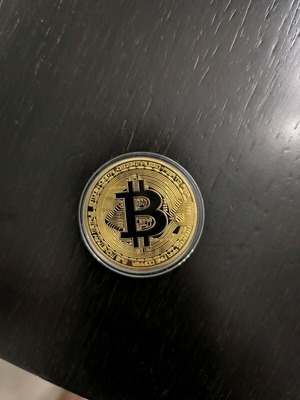 Metal bitcoin coin new in its packaging