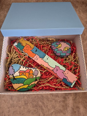Giftbox with 2 colorful stones and a bookmark