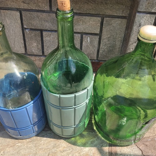 Vintage glass demijohns and storage jar set used, 4 pieces