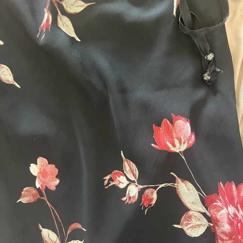 Black floral skirt with transparency medium, used