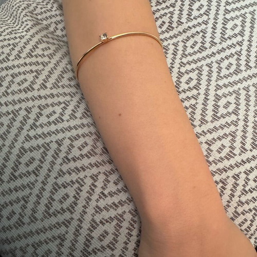 Bracelet cuff women's like new, metal with stone gold color