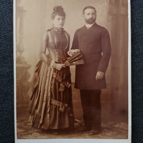 Photograph on thick cardboard used, with damages