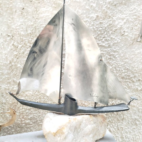 Handmade metal decorative ship made to order with white stone base