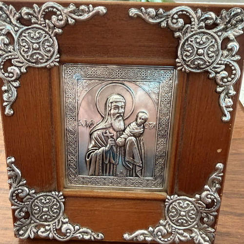 Icon of Saint Stylianos in wooden frame with metal decorations like new