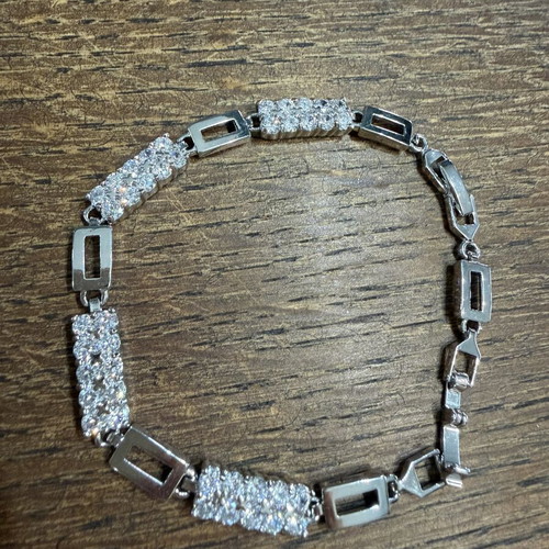 Bracelet with zirconia, new, adjustable size, silver color