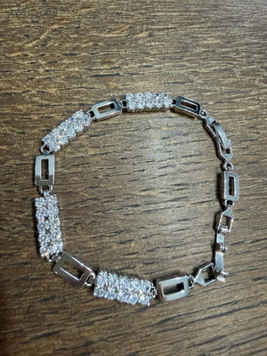 Bracelet with zirconia, new, adjustable size, silver color