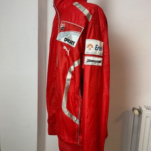 Ducati team jacket used, moderate condition with holes and stains