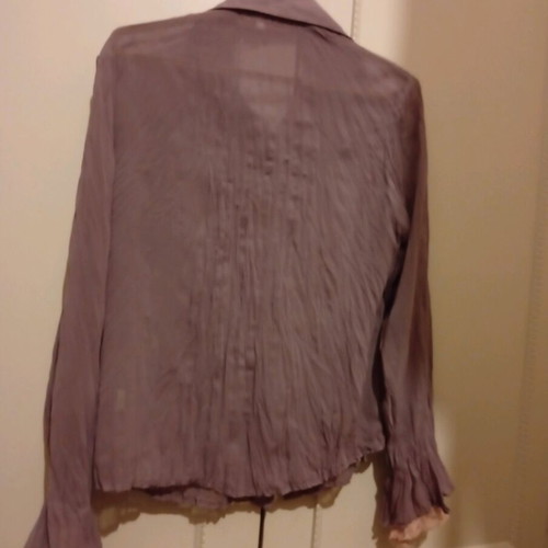 Shirt new size medium with sequins and impressive design