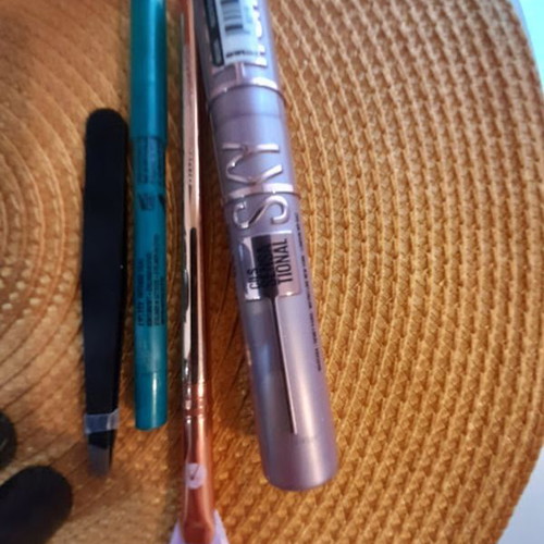 Set of used cosmetics with new Maybeline Sky High mascara