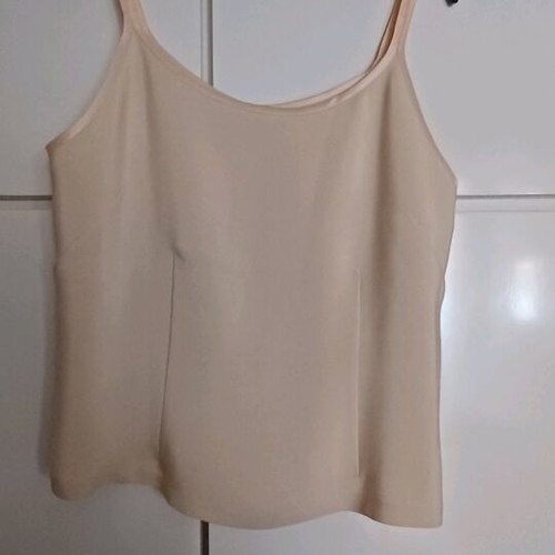 Sleeveless blouse with satin detail and side zipper, size small like new