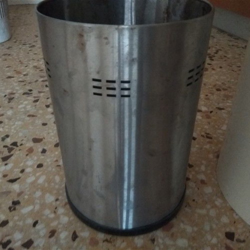 Two trash bins used, metal and plastic with pedal
