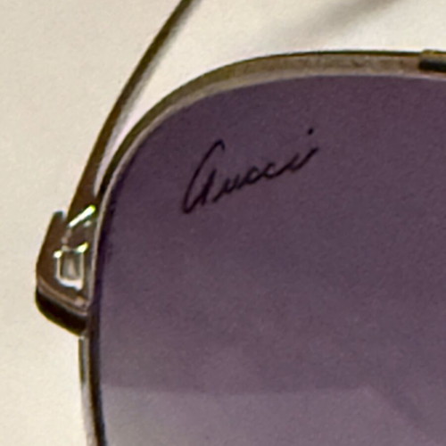Gucci purple degrade sunglasses used with minor lens wear
