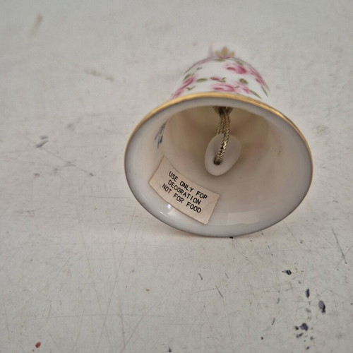 Porcelain decorative bell with floral design and gold details, new