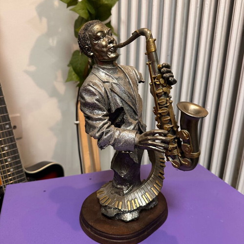 Vintage Jazz Saxophonist Figurine on Wooden Base like new